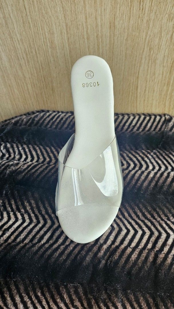 Clear Strap Heels (Category: Heels) located in Makati City. Submitted by shannebun (Listing ID 1462268145, Image 3). Description: Cute clear strap heels, size 36. White sole with a clear block heel. Easy slip-on. Perfect for parties or nights out!.