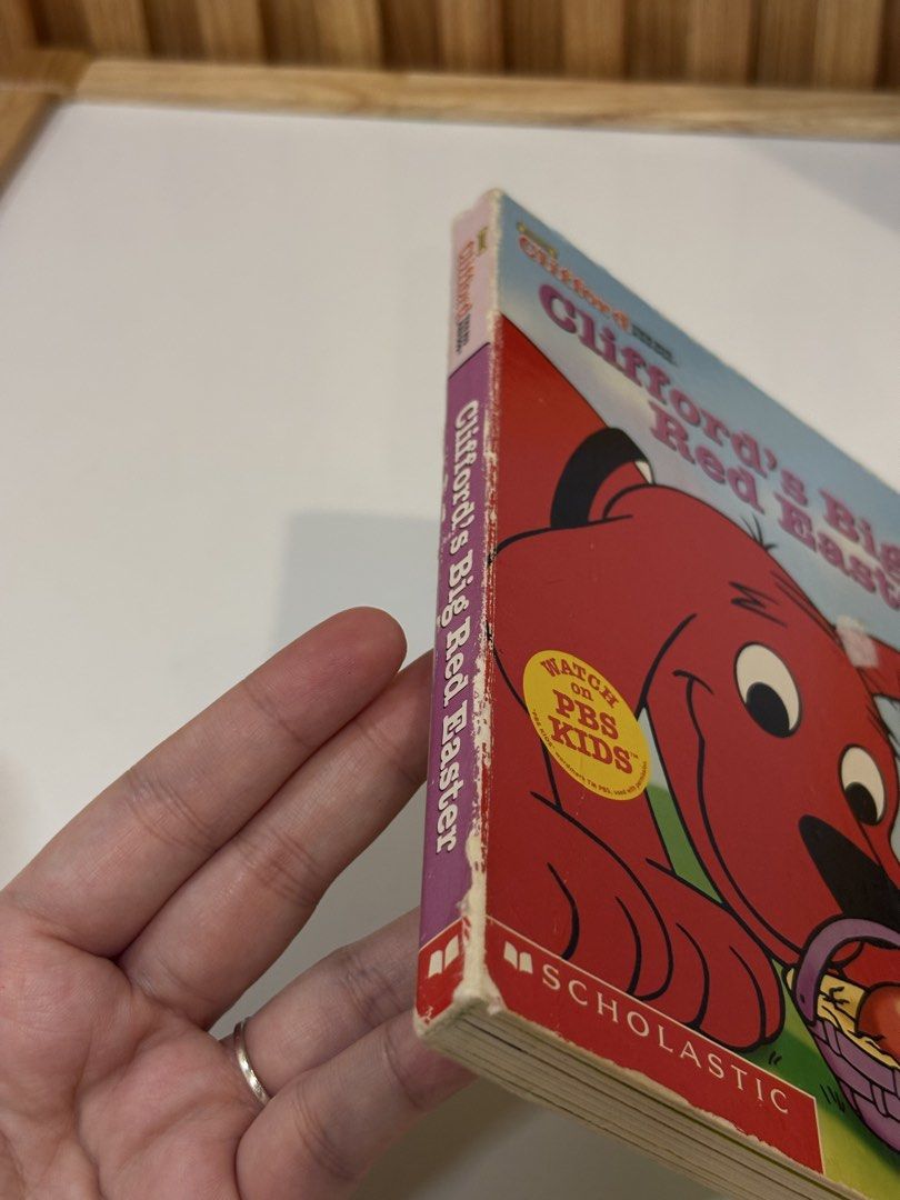 Clifford's Big Red Easter Scholastic Children's Book (Category: Children's Books) located in Quezon City. Submitted by sailormooooo (Listing ID 1462389404, Image 2). Description: - Clifford's Big Red Easter book - Features Clifford the Big Red Dog - Perfect for young readers - Published by Scholastic - Cover and edges show some wear from use - Pages are intact and readable - Fun Easter-themed story.