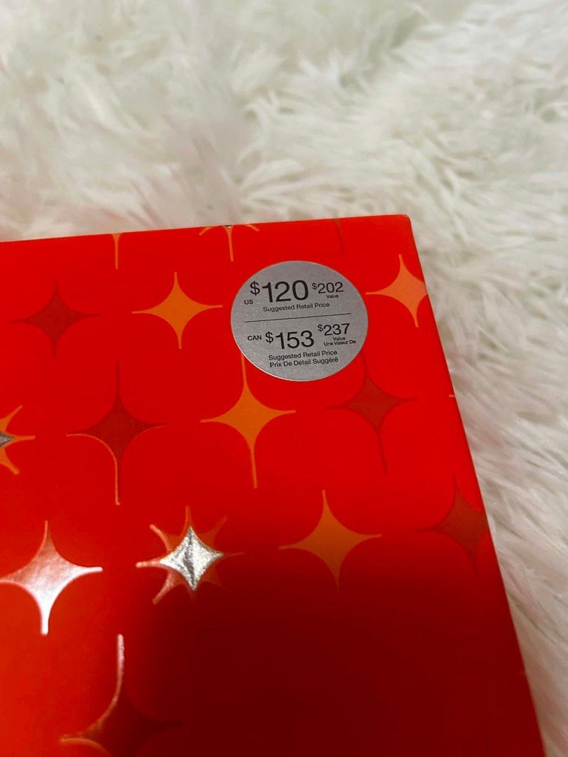 Clinique Happy Perfume Gift Set (Category: Fragrance & Deodorants) located in Quezon City. Submitted by ronalynmomoa22 (Listing ID 1462364049, Image 2). Description: - Clinique Happy fragrance gift set - Includes two full-size bottles and one rollerball - Presented in an orange box with star details - Ideal for gifting or personal enjoyment - Original Suggested Retail Price: $202 USD / $237 CAD.