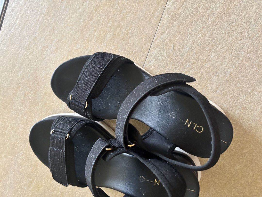 CLN Black Sparkly Strap Platform Sandals (Category: Sandals) located in Manila. Submitted by jrlua (Listing ID 1462290946, Image 1). Description: - Chic black sandals with dazzling sparkly straps. - Easy and adjustable velcro closure. - Comfortable platform sole for added height. - Stylish gold buckle accents. - Perfect for both casual outings and dressing up..