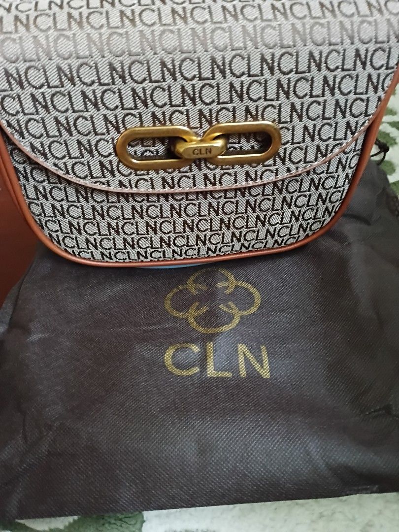 CLN Monogram Crossbody Bag with Strap (Category: Cross-body Bags) located in Muntinlupa City. Submitted by apobangpo_ot7 (Listing ID 1462276320, Image 3). Description: 📌 Used once lang po, personal use and store bought for 2499.. selling for 1499 only price tag lng po kulang. 😁 comes with its original eco bag and plastic po. Length: 8.60 inches Width: 2.90 inches Height: 6.90 inches Strap Drop: 21.0 inches (adjustable) - Brown CLN monogram cros