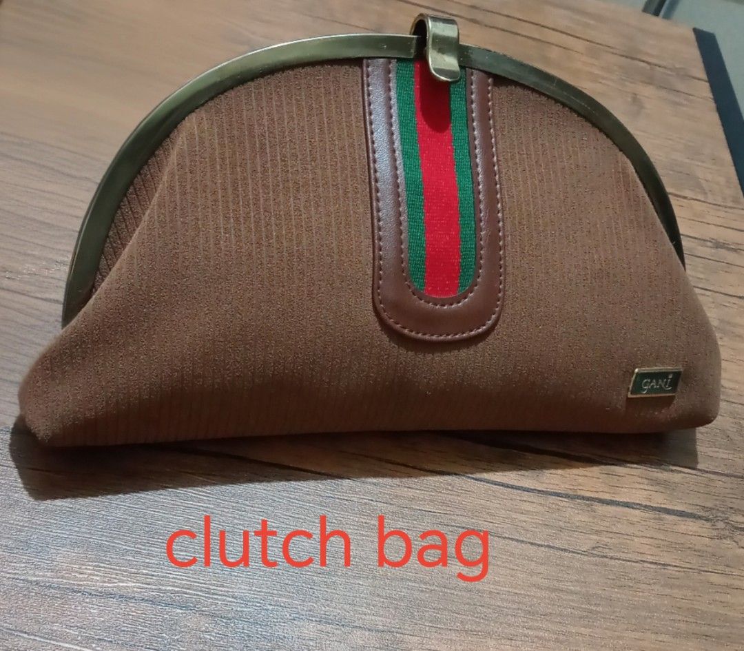 Clutch bag (Category: Clutches) located in Pasig City. Submitted by japanbag_12 (Listing ID 1462329122, Image 1). Description: slightly used rate 8/10.