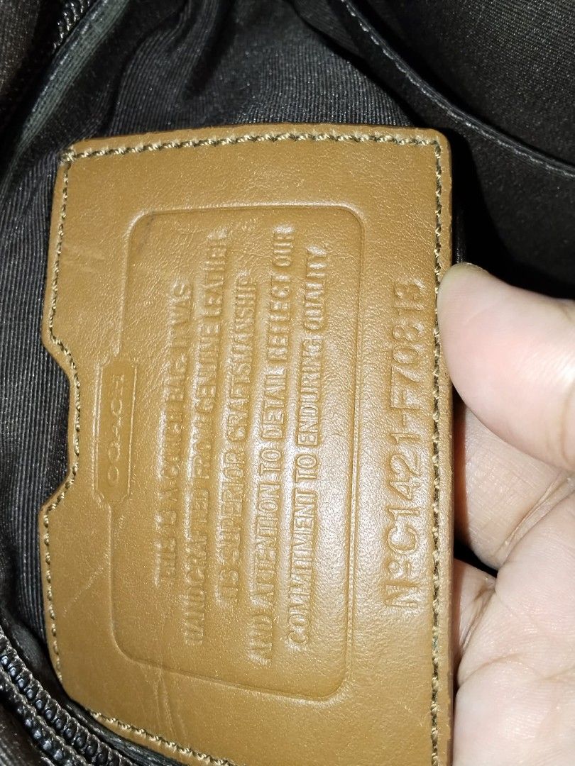 Coach Brown Leather Crossbody Bag (Category: Cross-body Bags) located in Manila. Submitted by bagelyascollection (Listing ID 1462366470, Image 2). Description: - Authentic Coach brown leather crossbody bag - Soft leather with some signs of wear, adding character - Main zippered compartment for secure storage - Additional front zippered pocket for quick access - Interior includes a zippered pocket and a slip pocket for organization - All zippers a