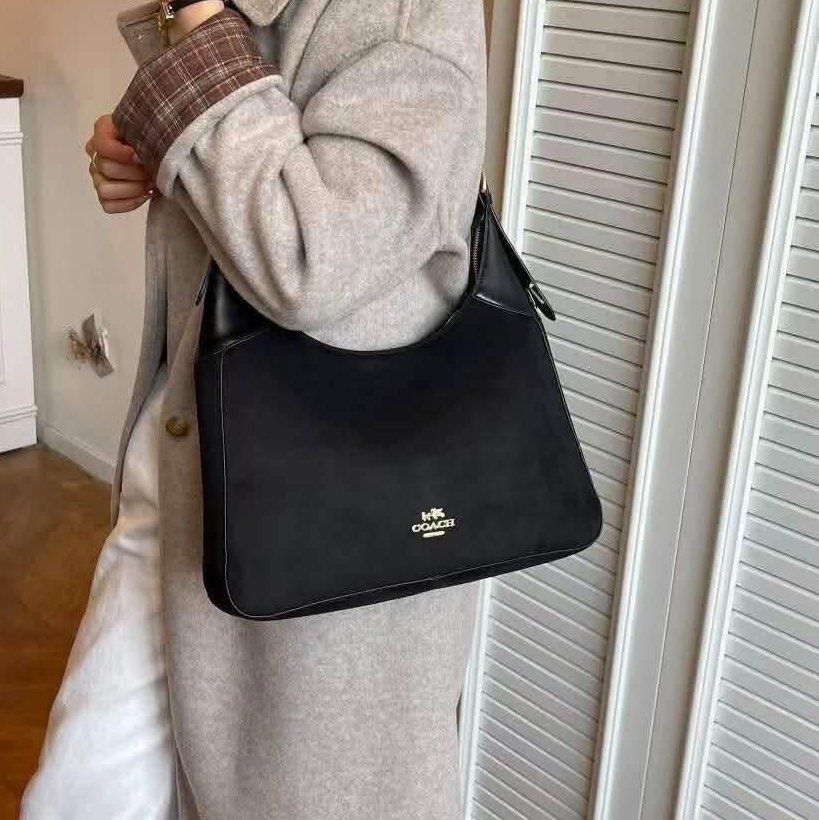 Coach Ella Shoulder Bag (Category: Shoulder Bags) located in Quezon City. Submitted by stuffs.hellyy (Listing ID 1462430944, Image 1). Description: with box leather made in vietnam.