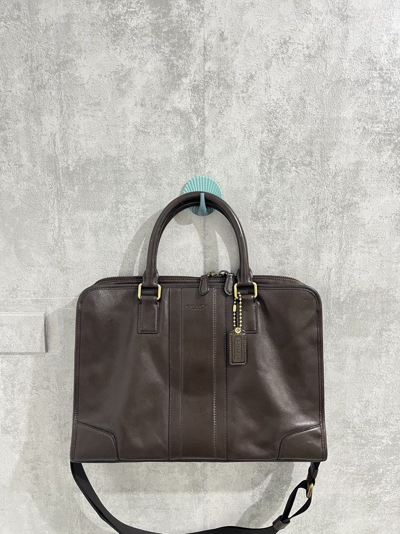 Coach Leather Briefcase Dark Brown (Category: Luxury Bags & Wallets) located in Calamba. Submitted by thedreambags.ph (Listing ID 1462355031, Image 1). Description: -no flaw -no any rubs -like new condition This is a Coach Metropolitan Slim Briefcase (also closely matching the Heritage Web Leather Slim Brief design). It is a professional 2-way commuter bag crafted from smooth, supple leather in a deep mahogany brown / chocolate color. - Authentic
