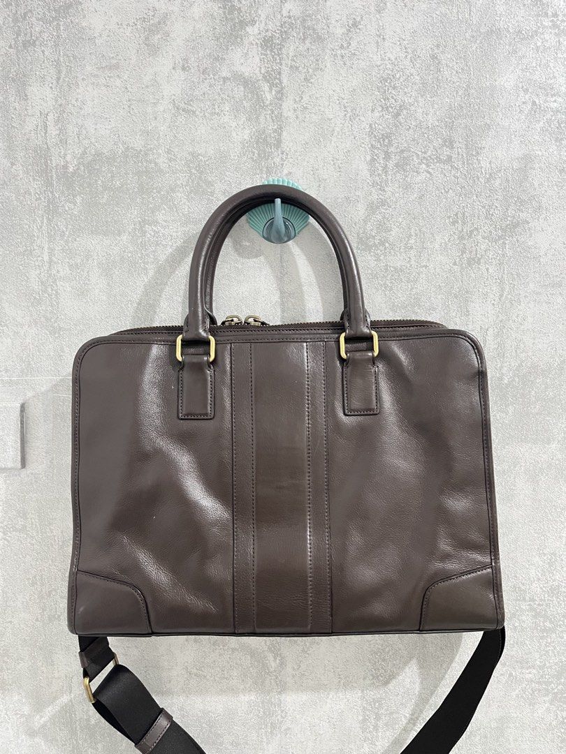 Coach Leather Briefcase Dark Brown (Category: Luxury Bags & Wallets) located in Calamba. Submitted by thedreambags.ph (Listing ID 1462355031, Image 2). Description: -no flaw -no any rubs -like new condition This is a Coach Metropolitan Slim Briefcase (also closely matching the Heritage Web Leather Slim Brief design). It is a professional 2-way commuter bag crafted from smooth, supple leather in a deep mahogany brown / chocolate color. - Authentic