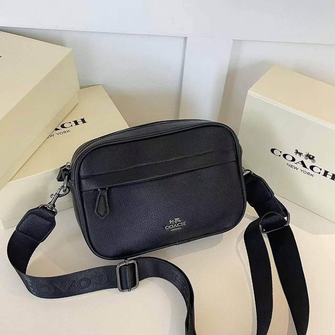 Coach men's crossbody camera bag (Category: Sling Bags) located in Quezon City. Submitted by stuffs.hellyy (Listing ID 1462430852, Image 3). Description: with box made in vietnam.