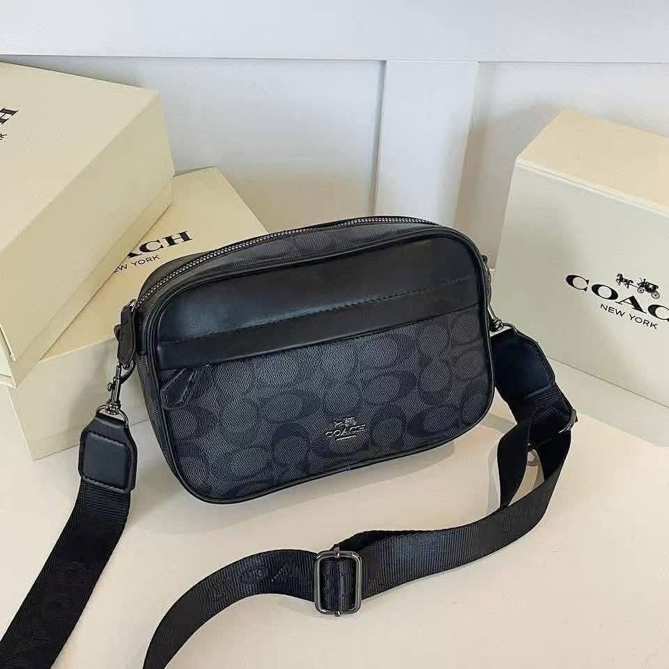 Coach men's crossbody camera bag (Category: Sling Bags) located in Quezon City. Submitted by stuffs.hellyy (Listing ID 1462430852, Image 2). Description: with box made in vietnam.