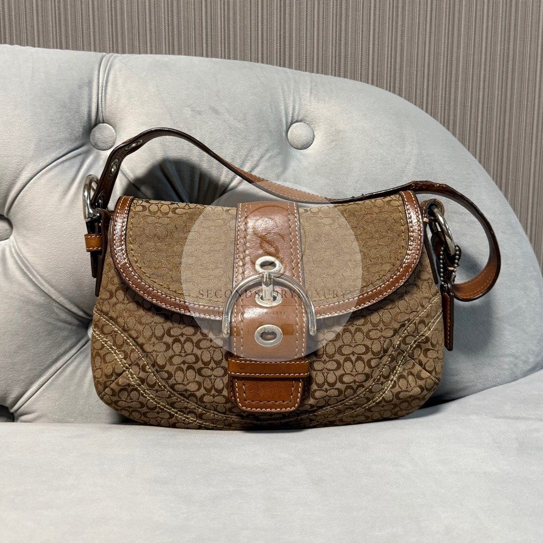 Coach Mini Soho Jacquard (Category: Luxury Bags & Wallets) located in Amadeo. Submitted by secondstoryluxury (Listing ID 1462300827, Image 1). Description: Issue with leather strap Check photos for reference.