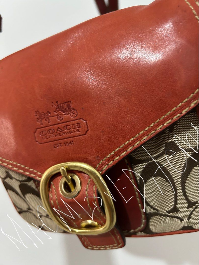 Coach Monogram Canvas Bleecker (Category: Luxury Bags & Wallets) located in Caloocan City. Submitted by macmloveditems (Listing ID 1462391586, Image 3). Description: - Vintage Coach Sling bag (XS -Fits Promax) - Classic monogram canvas with burnt orange leather trim - Gold buckle closure on front flap - Flawed leather strap (Pls check photos!!) -SIGNS OF USAGE (okay??) - Includes original Coach leather tag.