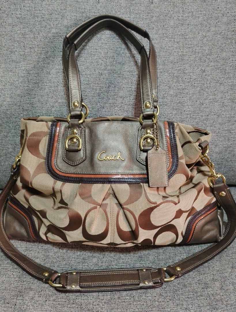 Coach Monogram Canvas Leather Trim Shoulder Bag (Category: Luxury Bags & Wallets) located in Caloocan City. Submitted by tweetyferrer (Listing ID 1462391676, Image 1). Description: Coach monogram canvas shoulder bag in brown and tan. Features leather trim, detachable strap, and gold hardware. Interior zip pocket and compartments. Perfect for daily use..
