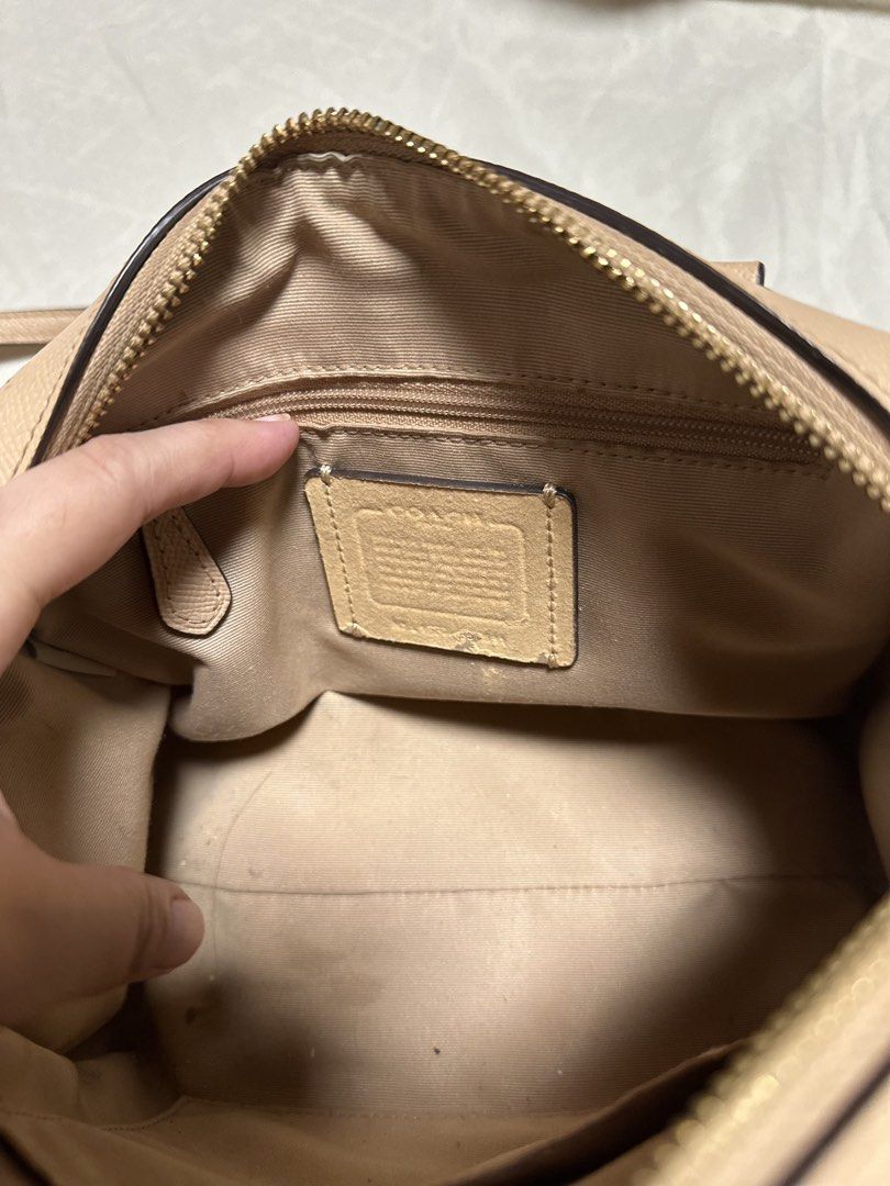 Coach Monogram Canvas Satchel Bag with Art Print (Category: Luxury Bags & Wallets) located in Cotabato. Submitted by pawpaw1027 (Listing ID 1462361949, Image 2). Description: - Tan Coach satchel bag - Unique art print on the front - Coach logo detail on top - Top handles for carrying - Detachable strap for versatile wear - Makes a great statement piece.