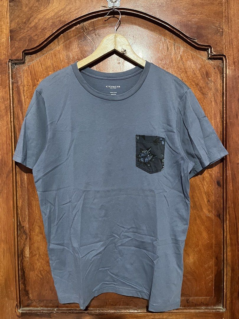 Coach pocket tee (Category: Tshirts & Polo Shirts ) located in Tumauini. Submitted by jomerthrift (Listing ID 1462399559, Image 1). Description: Dimes: 20.5x27 Color rate: 9.5/10 Issue nasa last pic isang pinhole sa baba.
