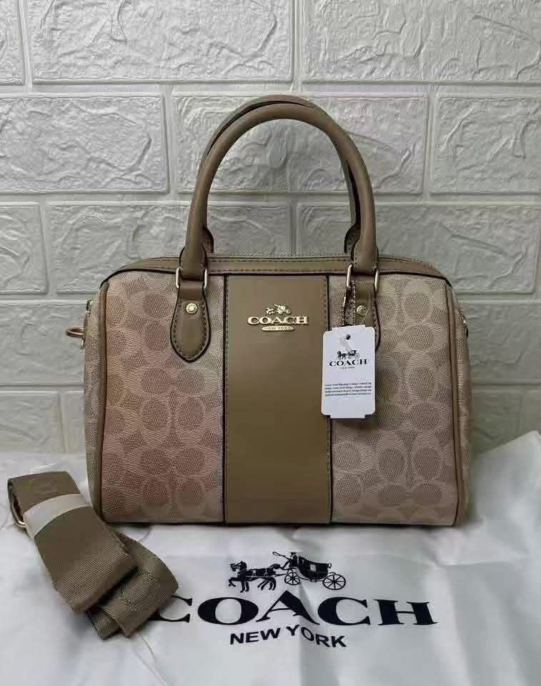 Coach Rowan Satchel Two way bag (Category: Cross-body Bags) located in Quezon City. Submitted by stuffs.hellyy (Listing ID 1462430725, Image 2). Description: smooth leather details and gold-tone hardware. 25cm Made in Vietnam 🇻🇳 .