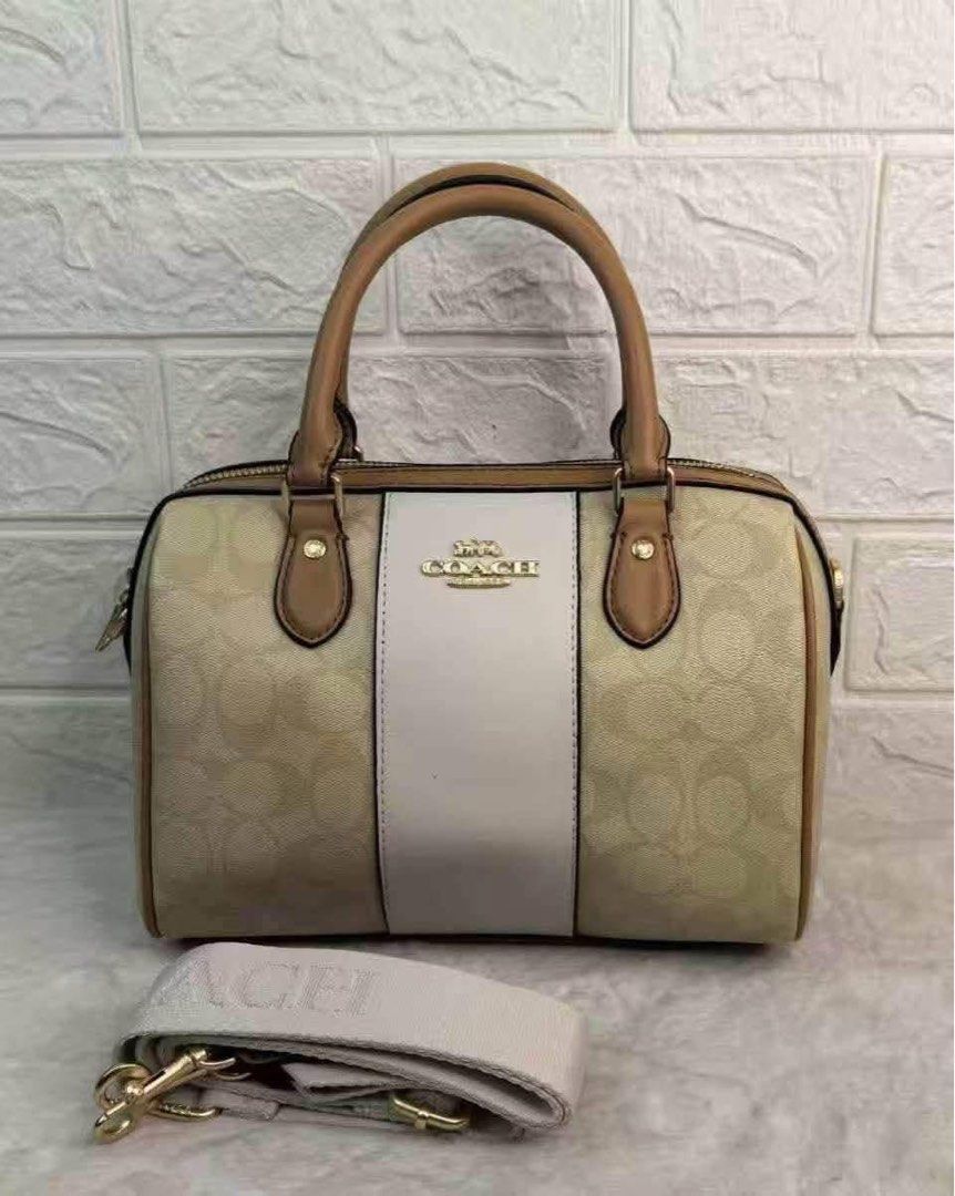 Coach Rowan Satchel Two way bag (Category: Cross-body Bags) located in Quezon City. Submitted by stuffs.hellyy (Listing ID 1462430725, Image 3). Description: smooth leather details and gold-tone hardware. 25cm Made in Vietnam 🇻🇳 .