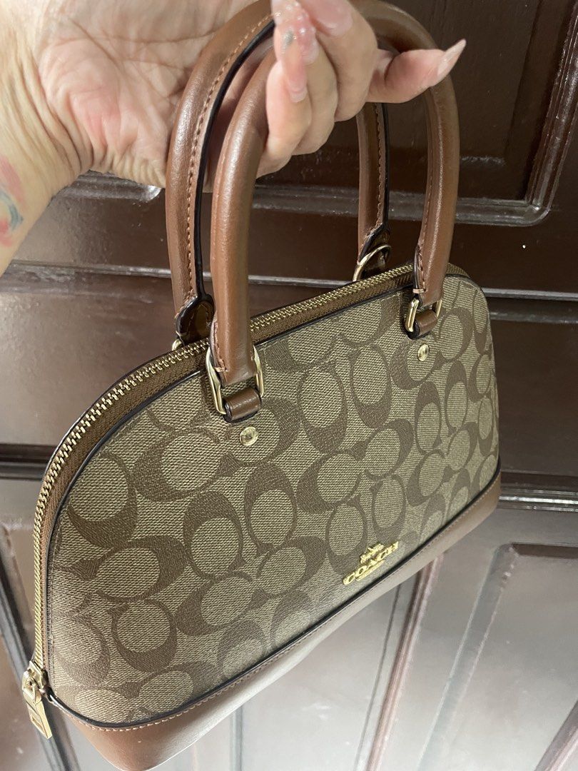 Coach Sierra bag only (Category: Luxury Bags & Wallets) located in Makati City. Submitted by sayonaracuratedcollections (Listing ID 1459531985, Image 3). Description: - Small Coach dome Sierra in signature monogram print - Brown leather trim and handles - Comes with a matching cardholder attached - Gold hardware - Great everyday bag with plenty of space inside.