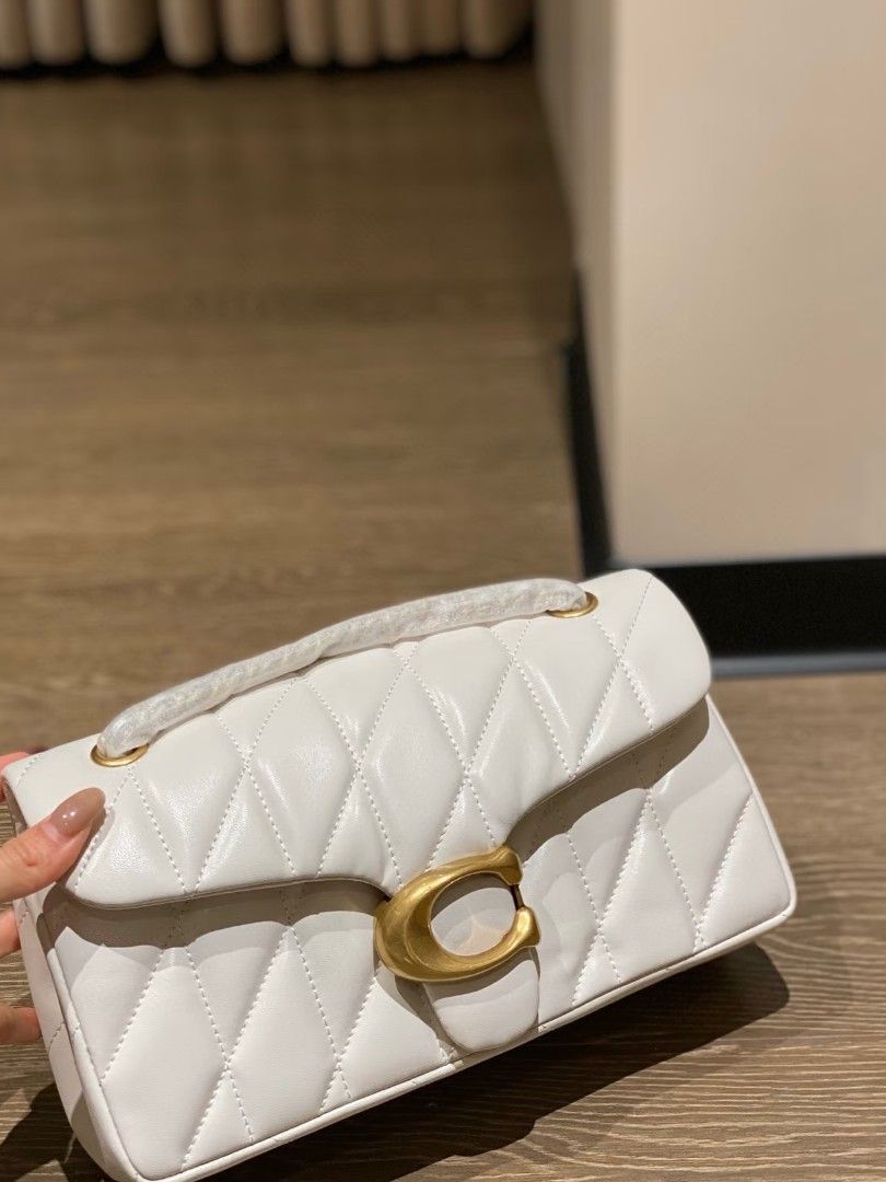 Coach Tabby in Quilted White (Category: Shoulder Bags) located in Pasig City. Submitted by maryjanegr (Listing ID 1462329983, Image 1). Description: .