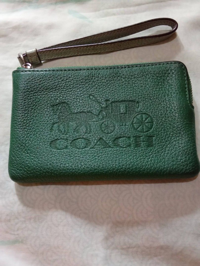 Coach wristlet (Category: Purses & Pouches) located in Davao. Submitted by hwagmahiyangtumawad (Listing ID 1462315550, Image 1). Description: original coach, corner zipp ,,from US..NO FLAWS.