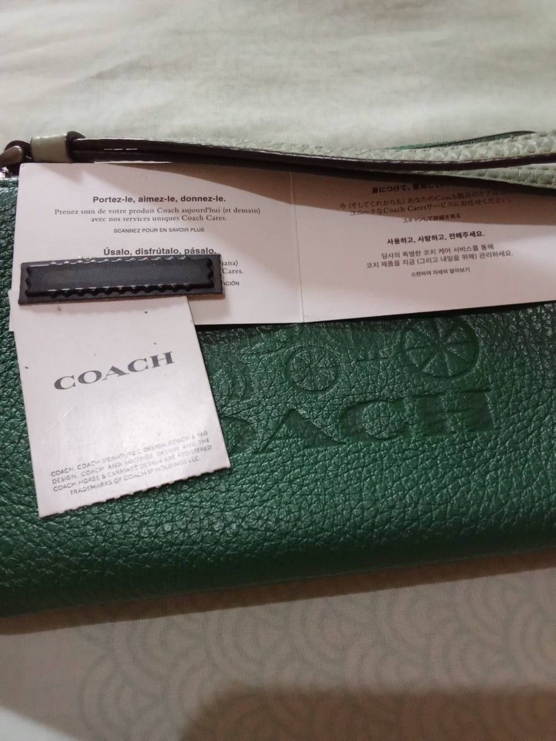 Coach wristlet (Category: Purses & Pouches) located in Davao. Submitted by hwagmahiyangtumawad (Listing ID 1462315550, Image 3). Description: original coach, corner zipp ,,from US..NO FLAWS.