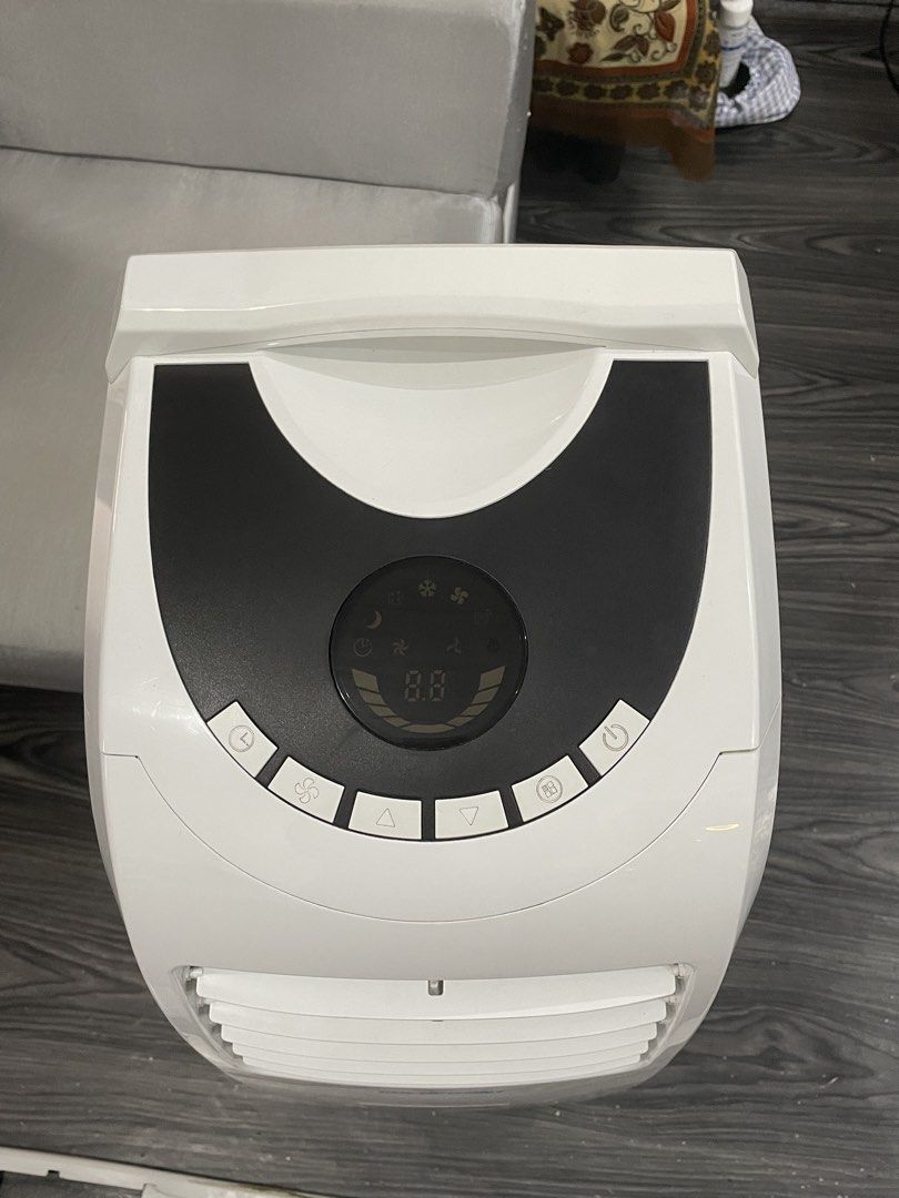 Coldfront Ntmpac-1 Portable Aircon with dehumidifier (Category: Air Conditioning and Heating) located in Santa Rosa. Submitted by dendelspecialtystore (Listing ID 1462336182, Image 3). Description: - Coldfront Portable Air Conditioner - Model: NTMPAC-1 - Power: 1300 Watts - Features: Self-evaporative system, low noise, high energy efficiency - Refrigerant: Environment-friendly R410A - Includes: Remote control, LED display - Condition: Works well 