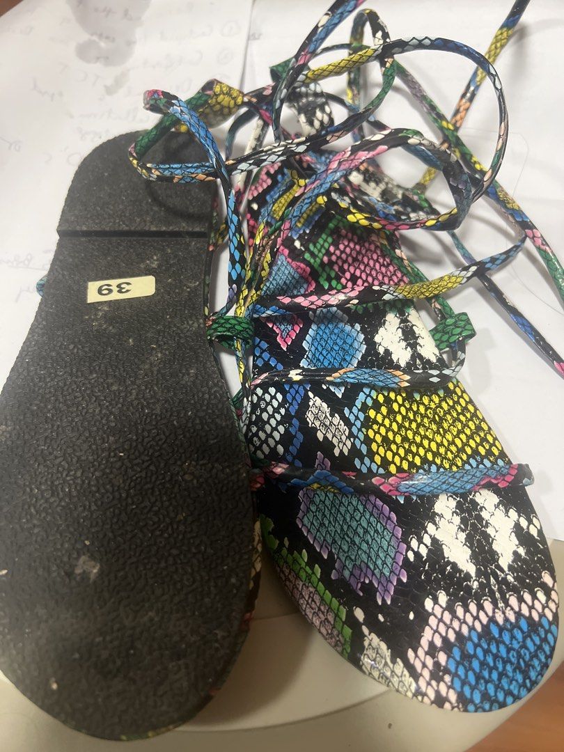 Colorful Snake Print Lace-Up Flat Sandals (Category: Flats & Sandals) located in Pasig City. Submitted by zebteashoppe01 (Listing ID 1462360149, Image 3). Description: - Fun and vibrant snake print design - Lace-up style, can be tied up the leg - Bright, eye-catching colors - Perfect for summer outfits - Sole indicates size 39 - Adds a pop of color to any look 09096535540 same gcash number mop Pasig .