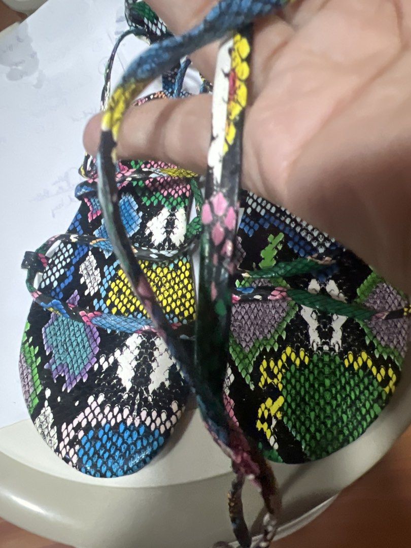 Colorful Snake Print Lace-Up Flat Sandals (Category: Flats & Sandals) located in Pasig City. Submitted by zebteashoppe01 (Listing ID 1462360149, Image 1). Description: - Fun and vibrant snake print design - Lace-up style, can be tied up the leg - Bright, eye-catching colors - Perfect for summer outfits - Sole indicates size 39 - Adds a pop of color to any look 09096535540 same gcash number mop Pasig .