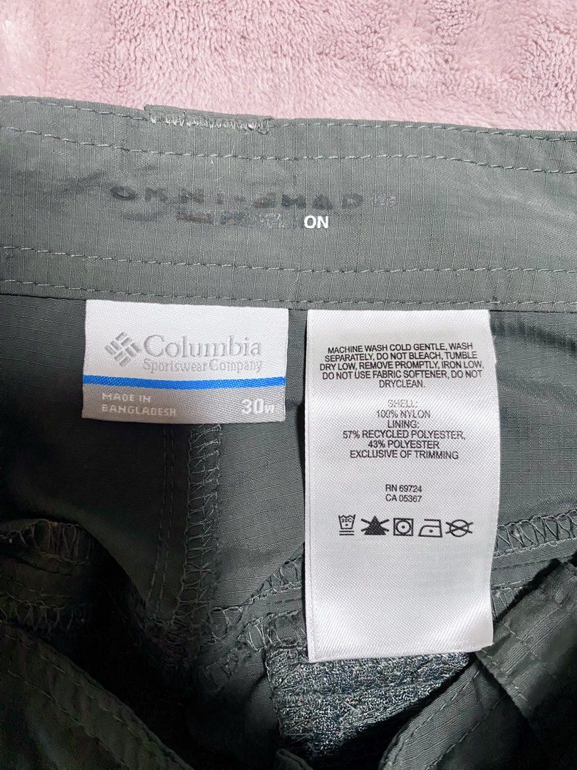 Columbia Cargo Pants with Belt Size 30W (Category: Trousers) located in Quezon City. Submitted by babyblue2022 (Listing ID 1462297824, Image 3). Description: - Columbia Cargo Pants - Color: Dark Grey - Size 30 waistline - Material: Nylon and Polyester Blend - Features: Multiple pockets, including a zippered pocket on the right thigh - Includes: Black belt - Ideal for: Outdoor activities, casual wear - Origin: Made in Bangladesh - Unisex, can be f