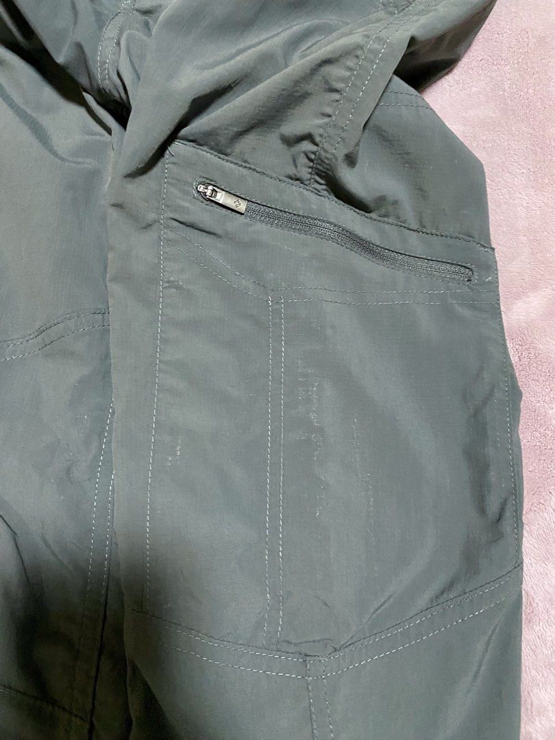 Columbia Cargo Pants with Belt Size 30W (Category: Trousers) located in Quezon City. Submitted by babyblue2022 (Listing ID 1462297824, Image 2). Description: - Columbia Cargo Pants - Color: Dark Grey - Size 30 waistline - Material: Nylon and Polyester Blend - Features: Multiple pockets, including a zippered pocket on the right thigh - Includes: Black belt - Ideal for: Outdoor activities, casual wear - Origin: Made in Bangladesh - Unisex, can be f