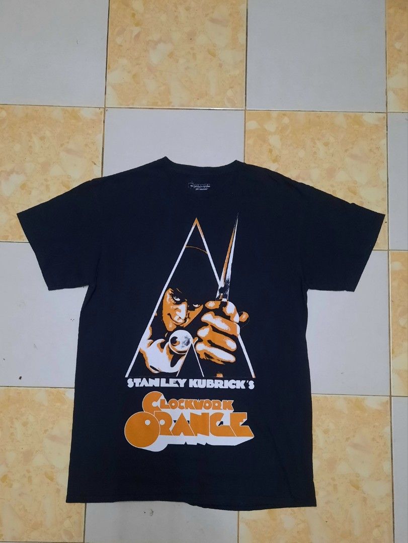 Combo Clockwork Orange (Category: Tshirts & Polo Shirts) located in Seri Kembangan. Submitted by mattrenton_store (Listing ID 1462406500, Image 3). Description: - Iconic Clockwork Orange 'Droog' poster art on the front - Close-up of Alex DeLarge on the back - Black t-shirt - Tagged M/M, fits like a true medium - 100% Cotton - Made in Honduras - Great for fans of the cult classic film - condition good - can see a foto for comform - dfod.