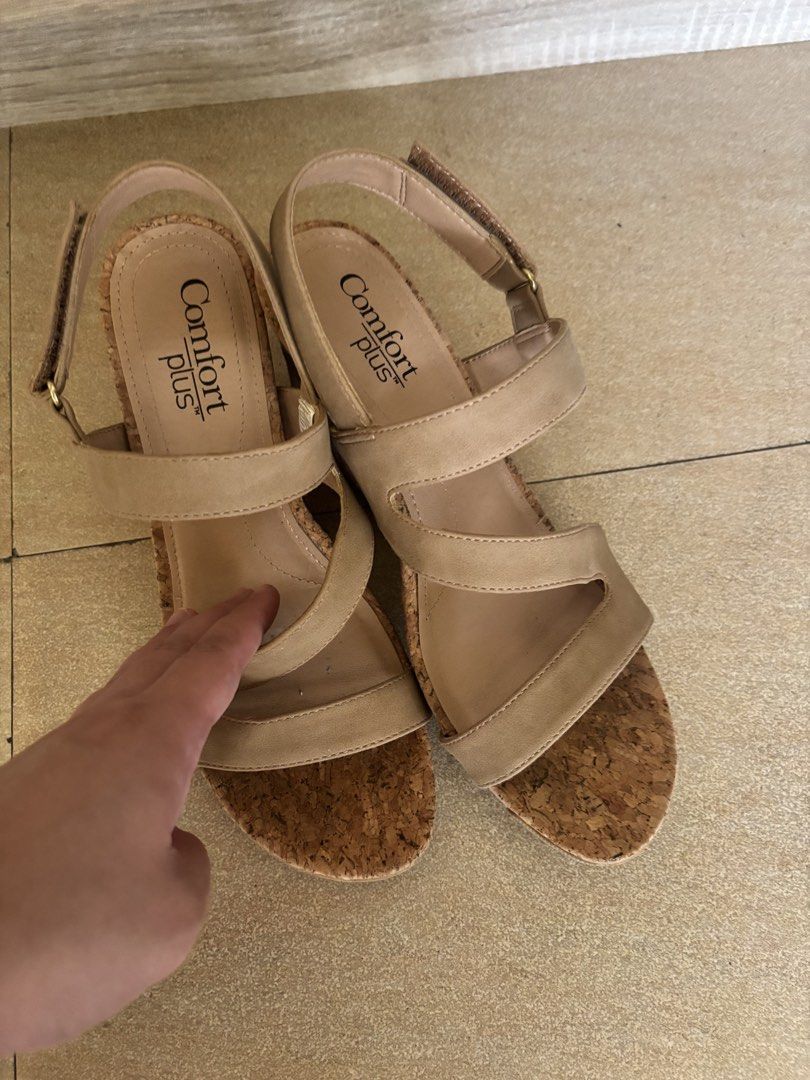 Comfort Plus Tan Cork Wedge Sandals (Category: Wedges) located in Manila. Submitted by jrlua (Listing ID 1462290822, Image 1). Description: - Comfort Plus wedge sandals - Tan color - Cork wedge sole - Adjustable ankle strap - Straps across the toes - Versatile: great for dressing up or down - Easy to wear for any occasion Very comfortable No flaws, used twice for an event.
