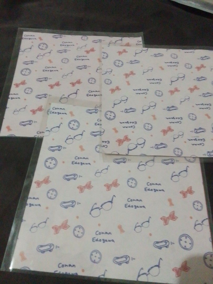 Conan Edogawa Origami Paper Set (Category: Other Stationery & Craft) located in Santa Rosa. Submitted by animemerchcollection (Listing ID 1462380862, Image 1). Description: - Adorable Conan Edogawa stationery paper - Two unique designs to choose from: - Design 1: Features glasses, bows, and clocks - Design 2: Includes Japanese text and cute pink stars - Ideal for writing letters or decorating your journal - Each sheet comes protected in a plastic
