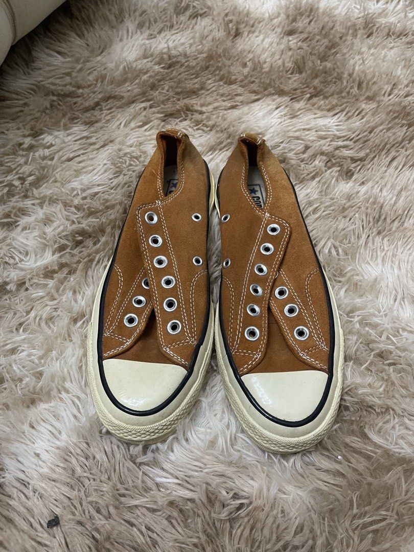 CONVERSE 70S LOW CUT SUEDE BROWN (SIZE 38) (Category: Sneakers) located in Concepcion. Submitted by wowsinigangmix (Listing ID 1462413246, Image 1). Description: CONVERSE 70S LOW CUT SUEDE MATERIAL COLOR BROWN SIZE 38 HAS FLAWS STORED IN CABINET YELLOWISH SOLE NO BOX NO STRINGS NEEDS CLEANING PLEASE MANAGE EXPECTATIONS.