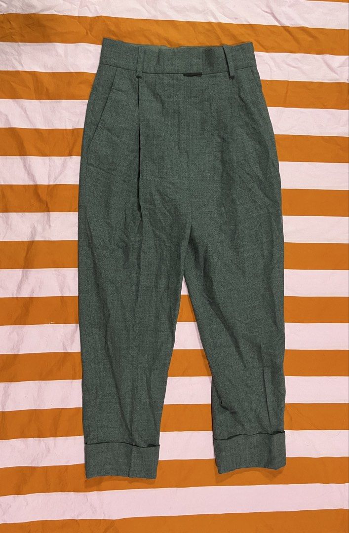 COS Gray Pleated Cropped Trousers (Category: Other Bottoms) located in Mandaluyong City. Submitted by hopeworldplane (Listing ID 1462419602, Image 1). Description: - COS green trousers - Cropped length with cuffed hem - Pleated front - Classic waistband with belt loops - Made in Turkey - Ideal for smart casual outfits.