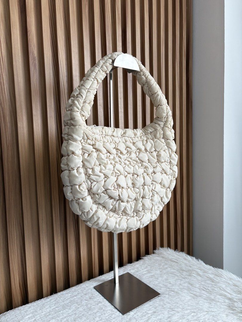 COS QUILTED SMALL BAG IN LIGHT BEIGE (Category: Shoulder Bags) located in Imus. Submitted by dumpitlikeaqueen (Listing ID 1462315212, Image 2). Description: • Bag only • With signs of usage & stain • Open for layaway • Instagram Shop: @dumpitlikeaqueen.