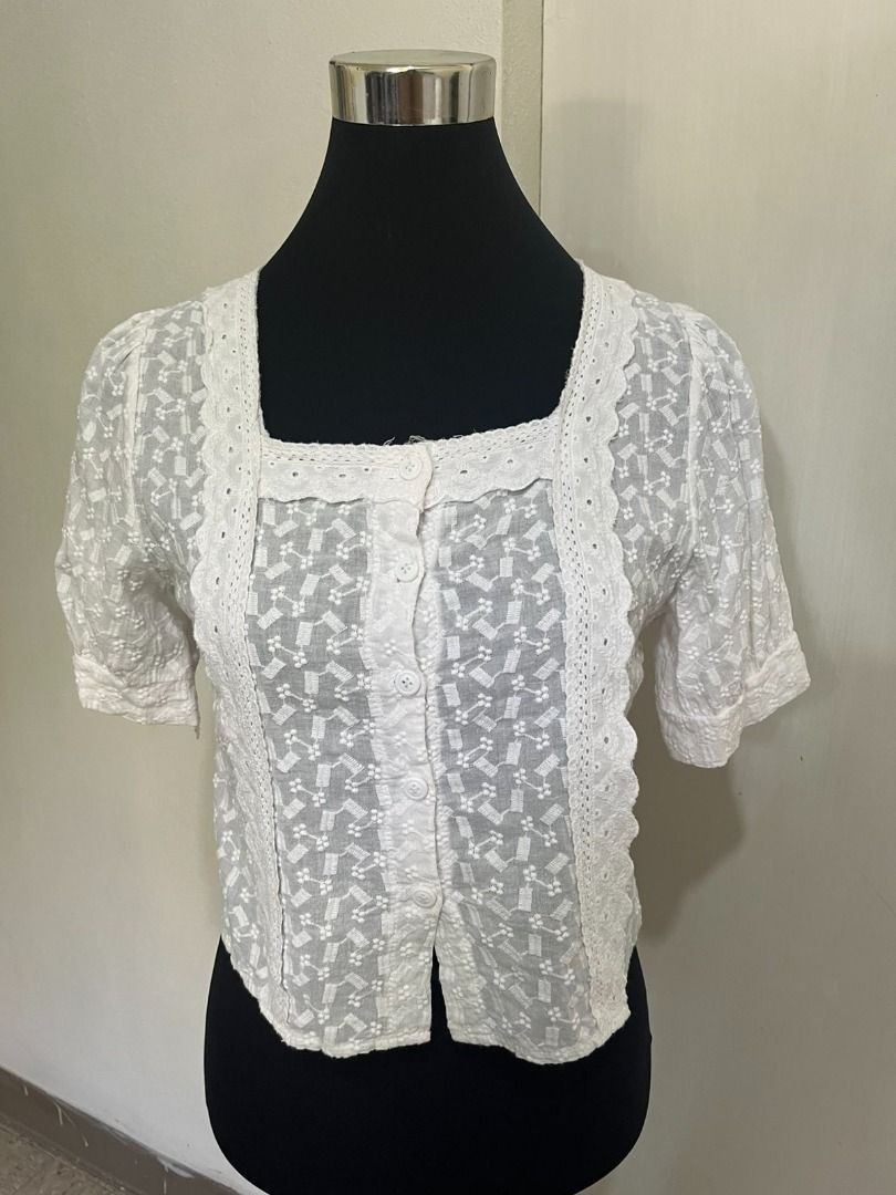 Cottagecore Eyelet Embroidery Square Neck Blouse (Category: Blouses) located in Mabalacat. Submitted by keb-a (Listing ID 1462320819, Image 1). Description: 🍒 — small — b: 32~34" — w: 24~26" — l: 17” 🍒 — eyelet embroidery w/ beautiful, textured floral pattern throughout the fabric — elegant lace detailing framing the neckline and the front button panel — chic, vintage-inspired neckline that highlights the collarbones — functional button-down de