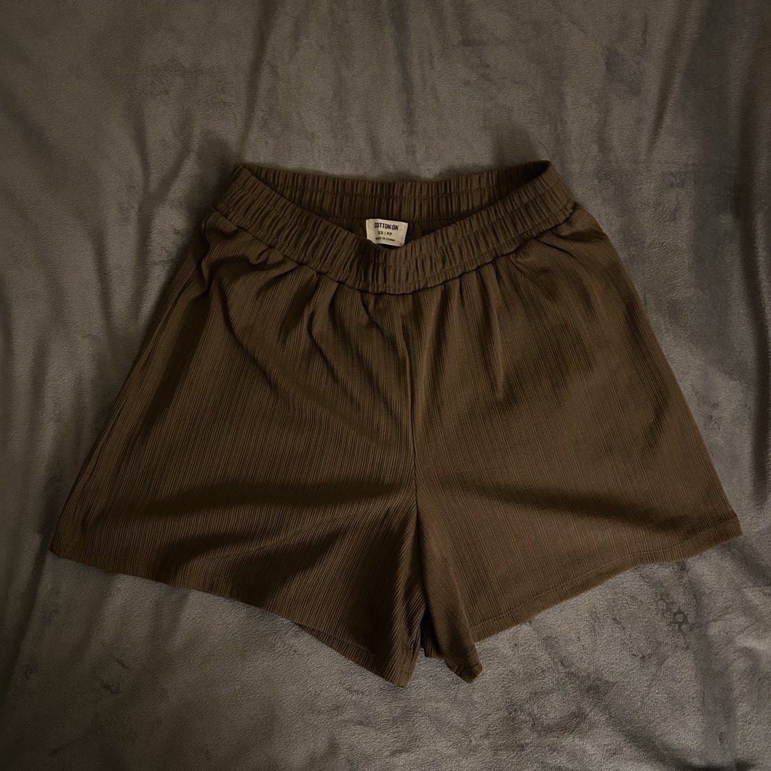 Cotton On Brown Ribbed Lounge Shorts (Category: Shorts) located in Davao. Submitted by excessexpress (Listing ID 1462429565, Image 1). Description: Size : XS on tag - Comfy brown shorts from Cotton On - Ribbed texture all over - Elastic waistband for a relaxed fit - Ideal for lounging or casual wear - Size XS/TP.