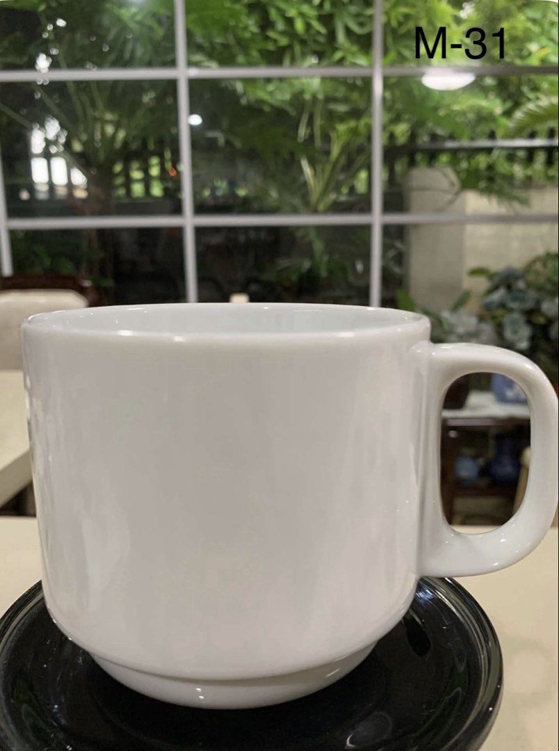 Crate & Barrel Martin Hunt White Ceramic Mug (Category: Coffee & Tea Tableware) located in Quezon City. Submitted by meggoquingco (Listing ID 1462377177, Image 1). Description: - Brand: Crate & Barrel - Designer: Martin Hunt - Material: White Ceramic - Origin: Made in Sri Lanka - Ideal for: Morning coffee or tea - Style: Clean and simple design.