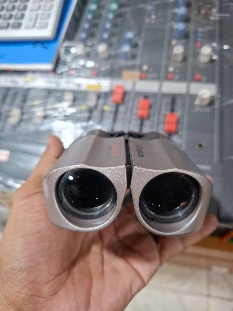 Craton 13-50x27 MC Zoom Binoculars (Category: Lens & Kits) located in Santa Rosa. Submitted by echojapansurplus_01 (Listing ID 1462386696, Image 2). Description: - Craton Zoom Binoculars by Kenko. - Powerful magnification: 13x to 50x - Objective lens diameter: 27mm - Wide field of view: 2.4 degrees at 13x - Ideal for bird watching and outdoor activities - Compact and portable design.
