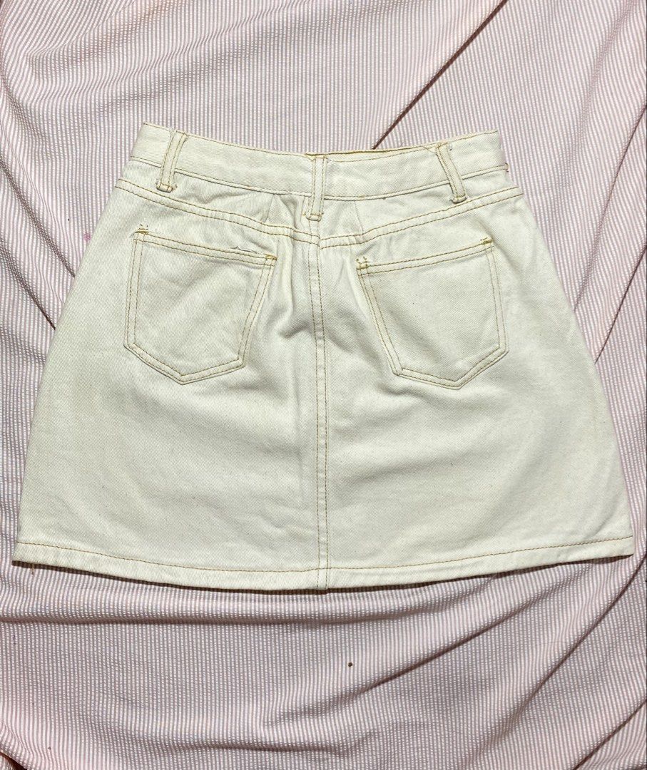 Cream Denim A-Line Mini Skirt (Category: Skirts) located in Paranaque City. Submitted by golden_jinkay (Listing ID 1462424716, Image 2). Description: -Waist 25-26 -Lenght-15 - Cream denim mini skirt - A-line cut - Classic five-pocket styling - Button and zip closure - Size: W:24-26 L:15 - Ideal for casual wear - Easy to pair with various tops.