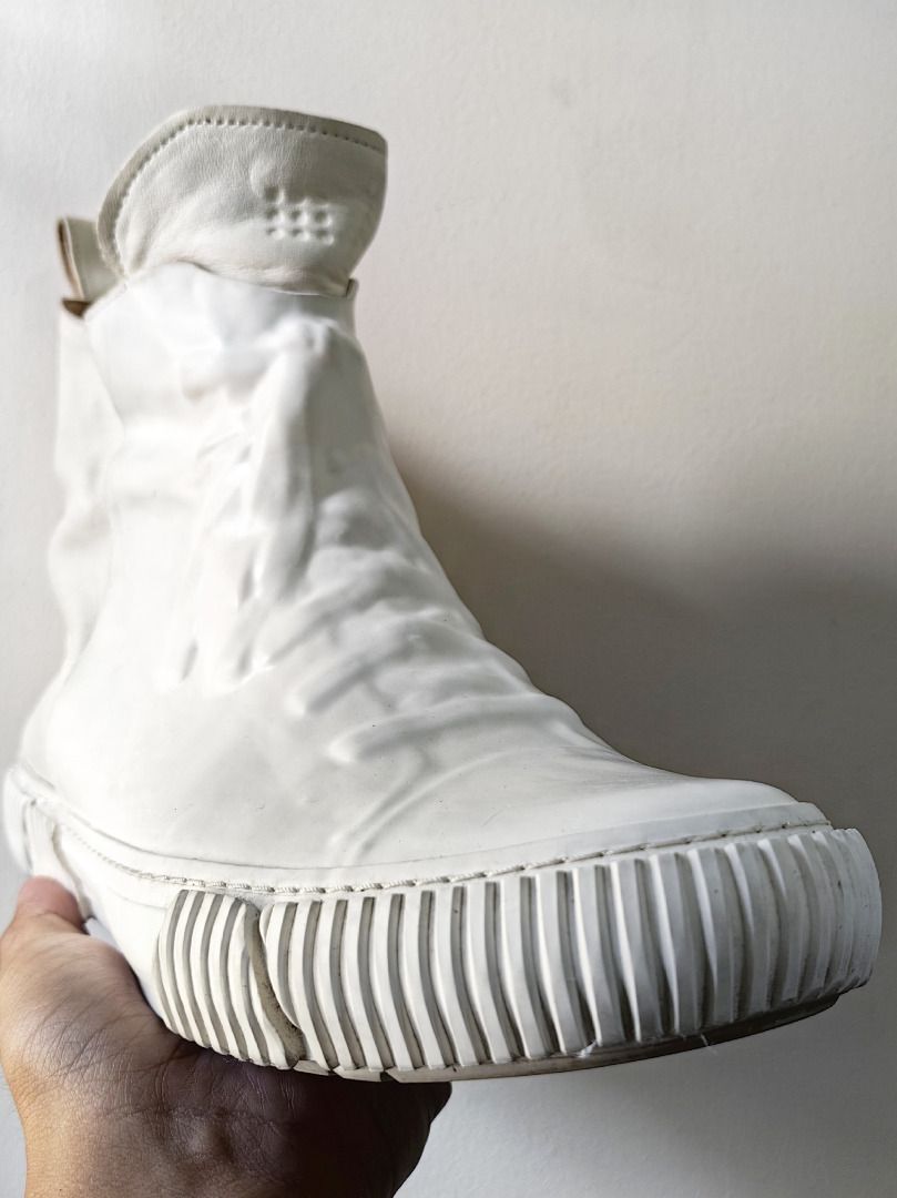 Cream High-top Sneakers with Side Zip (Category: Casual Shoes) located in Tarlac. Submitted by jeremiah.curator.2026 (Listing ID 1462433749, Image 3). Description: - Cream high-top sneakers - Unique all-over textured design - Convenient side zip closure - Rubber sole with ribbed detail - Cool, edgy style for casual outfits.