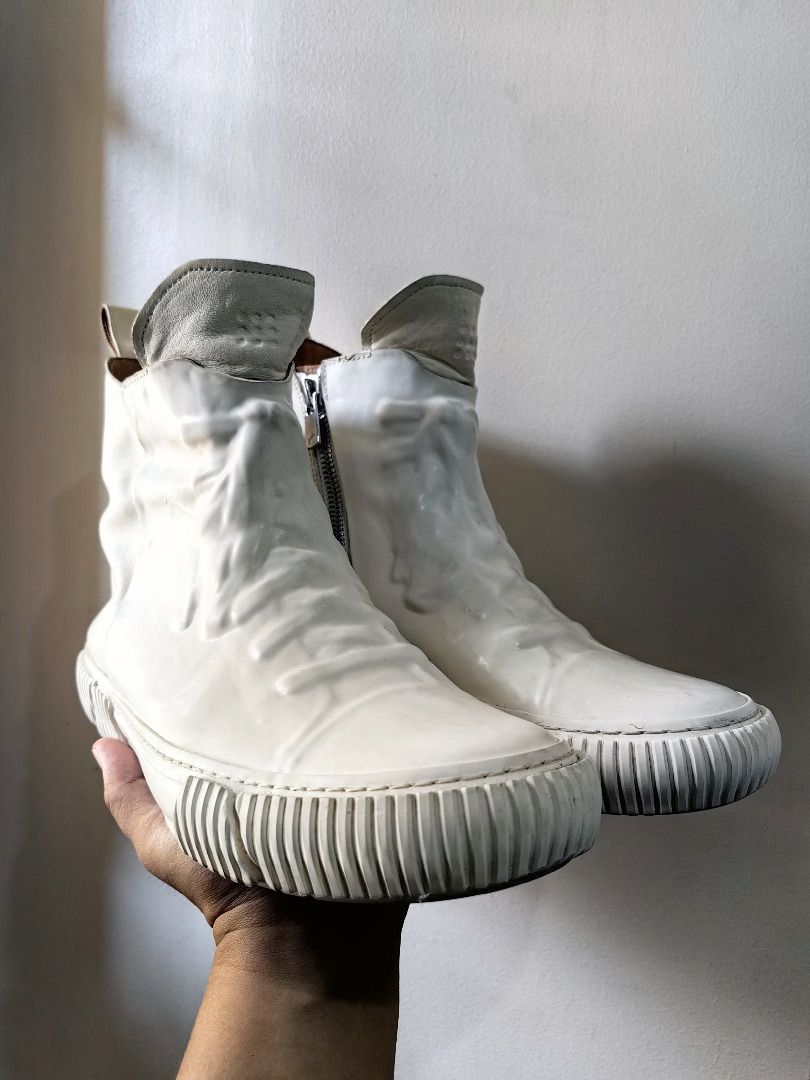 Cream High-top Sneakers with Side Zip (Category: Casual Shoes) located in Tarlac. Submitted by jeremiah.curator.2026 (Listing ID 1462433749, Image 2). Description: - Cream high-top sneakers - Unique all-over textured design - Convenient side zip closure - Rubber sole with ribbed detail - Cool, edgy style for casual outfits.