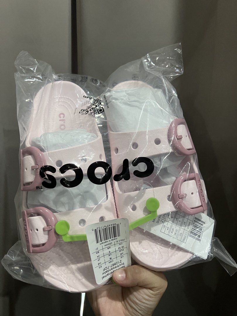 Crocs Classic Crush Clog Pink Sandals (Category: Sandals) located in Baliuag. Submitted by shop.avg (Listing ID 1462314841, Image 1). Description: - Brand new Pink Crocs Classic Crush Clogs - Still in original packaging - Features adjustable straps - Signature Crocs holes - Soft pastel pink color - Ideal for casual wear.