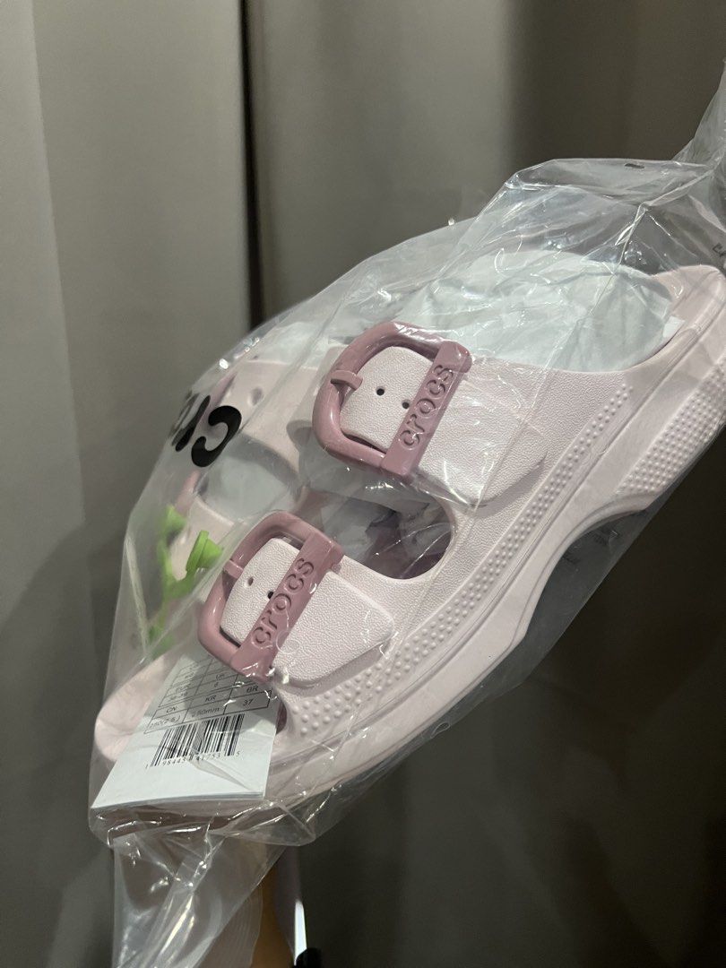 Crocs Classic Crush Clog Pink Sandals (Category: Sandals) located in Baliuag. Submitted by shop.avg (Listing ID 1462314841, Image 3). Description: - Brand new Pink Crocs Classic Crush Clogs - Still in original packaging - Features adjustable straps - Signature Crocs holes - Soft pastel pink color - Ideal for casual wear.