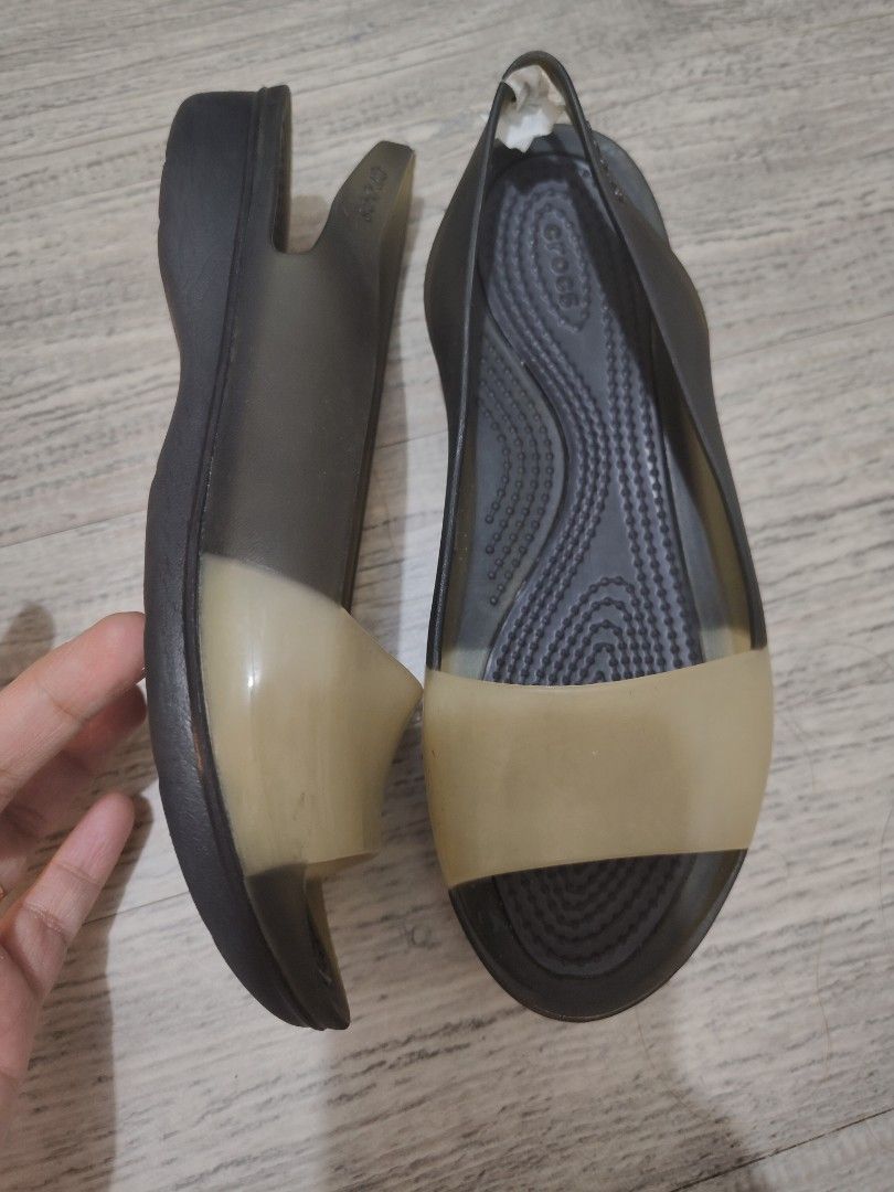 Crocs Women's Slingback Flats US 5 (Category: Flats & Sandals) located in Calamba. Submitted by an_ne0501 (Listing ID 1462402425, Image 2). Description: - Crocs slingback flats - Color: Dark grey/black - Translucent tan toe strap - Comfortable and easy to slip on - Soles with good grip - Size: W5 / EU 34-35 / 22cm insole - Made in China.