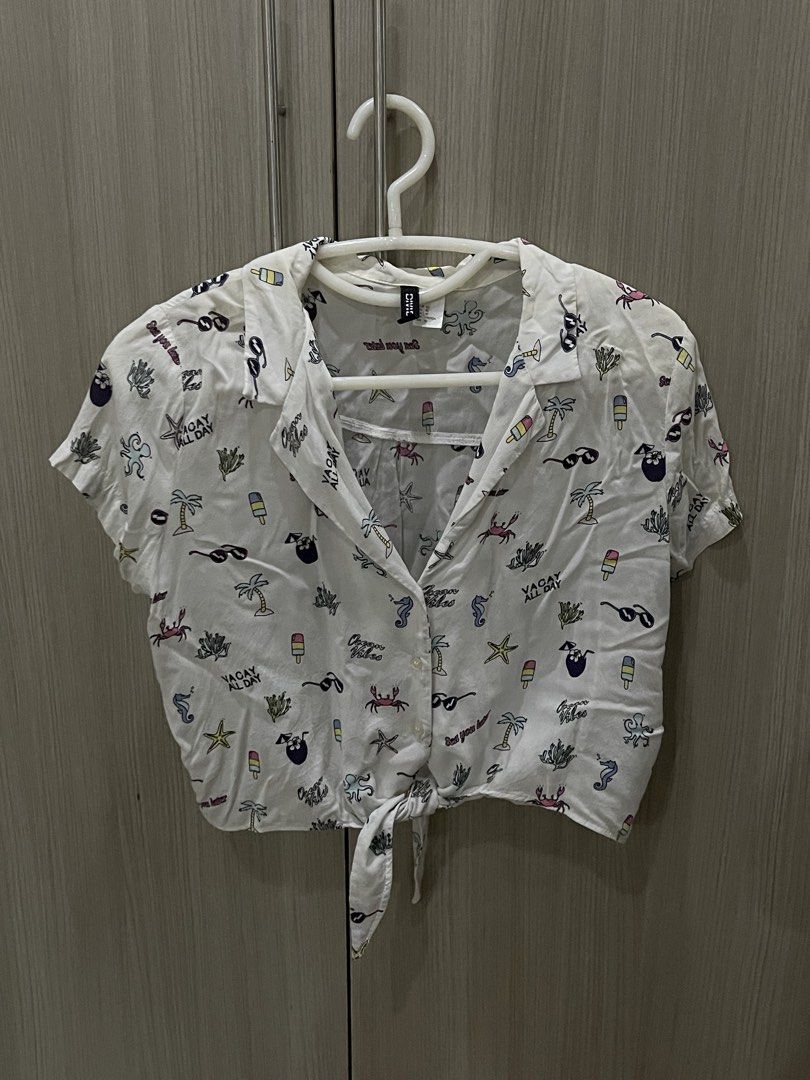 Cropped tie top (Category: Blouses) located in Manila. Submitted by shiezzels (Listing ID 1462408378, Image 1). Description: H&M Divided cropped polo top Size 10 Fits medium to semi-large.
