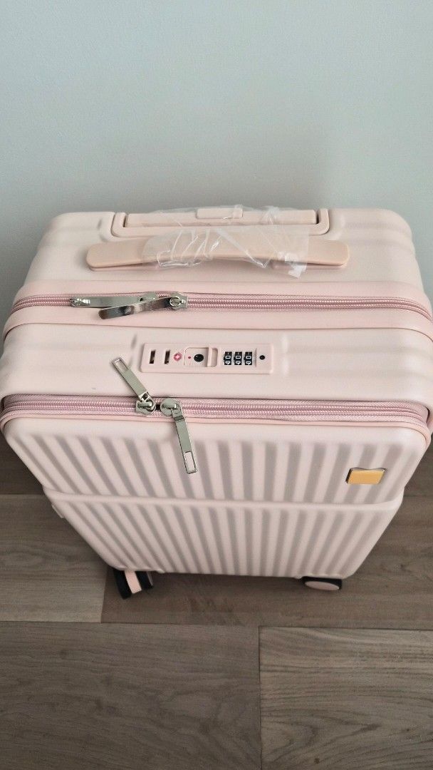 Cute carry-on luggage with front pocket (Category: Luggage) located in Quezon City. Submitted by mooneon (Listing ID 1462313813, Image 3). Description: - Lightweight carry-on luggage - Secure combination TSA lock - Smooth rolling wheels - Includes dust cover -Available in pink and white - With easy-access lockable front pocket -Have multiple stocks of this -2.8kg -20x36x50cm.