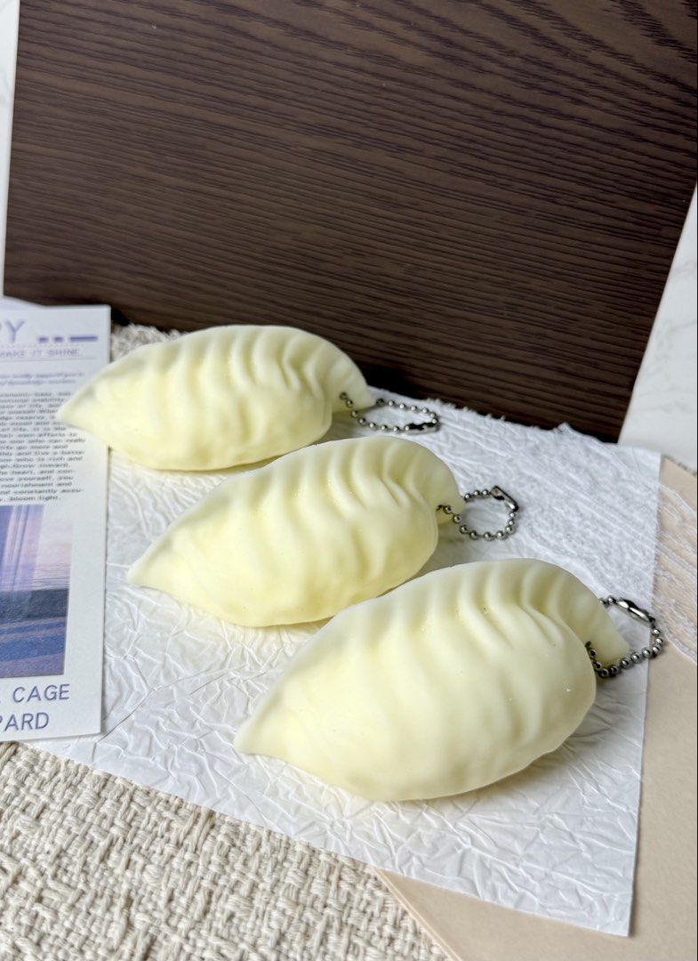 Cute Dumpling Squishy Keychain Charm (Category: Other Stationery & Craft) located in Manila. Submitted by shop.celestee (Listing ID 1462398188, Image 1). Description: Very very cute dumpling squishy Must have if you like dumplings Perfect gift idea!! - Adorable dumpling-shaped squishy - Comes with a keychain ring - Ideal for stress relief - Cute accessory for bags or keys - Soft and squeezable texture - Individually wrapped.