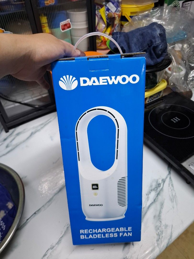 Daewoo Rechargeable Bladeless Fan (Category: Fans) located in Manila. Submitted by jeremy1012 (Listing ID 1462295066, Image 1). Description: - Innovative Daewoo Bladeless Fan for modern spaces - Features exposed blades for effective cooling - Built-in LED display and air inlet - Power Output: 5V 1A 3W - Battery Capacity: 2200mAh - Charging Time: 4 hours - Working Time: 3-8 hours - Compact Size: 14.5cm x 14.5cm x 37cm.