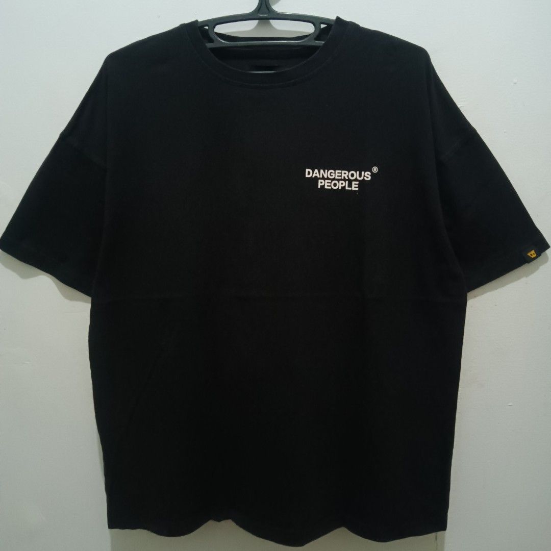 DANGEROUS PEOPLE Black Shirt (Category: Tshirts & Polo Shirts ) located in Caloocan City. Submitted by jaychingsss (Listing ID 1462364725, Image 2). Description: Dangerous People Black Shirt - 100 22x26 Color Rate: 9.5/10 Complete Tags Semi Heavy Cotton No issue NEED WASH.