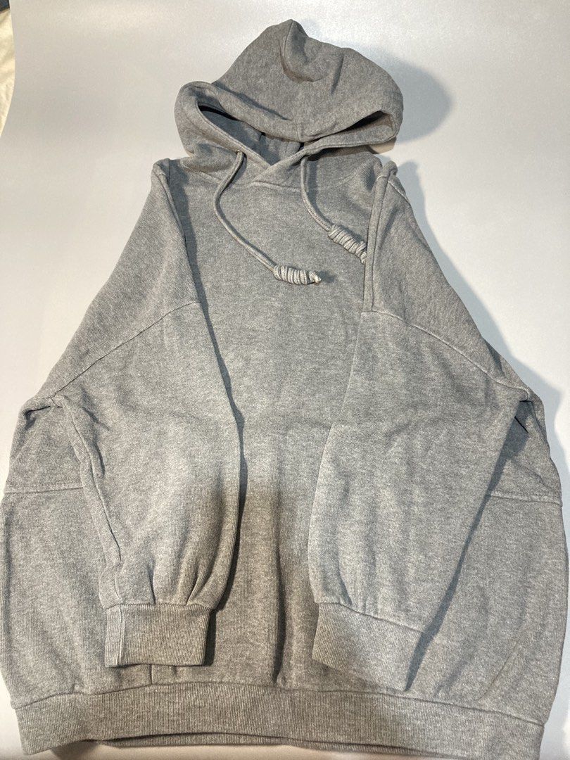 Dark gray hoodie (Category: Hoodies) located in Manila. Submitted by prelovedstoreforyou (Listing ID 1462392692, Image 1). Description: Sofer haba sakin and hindi ko nagagamit. I only wore it once..